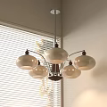 Modern Five Light Chandelier With Metal Frame Glass Shades In Interior With Window Blinds