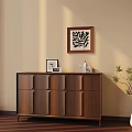Wooden Cabinet With Framed Photo Sculpture Wall Art And Potted Plant Interior Decor