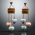 Vintage Chandeliers With Colorful Glass Shades And Golden Metal Frames