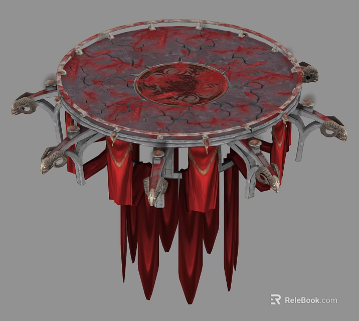 Ornate Circular Decorative Object With Red Fabric Tassels And Metal Accents 3d model 