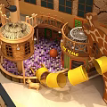 Indoor Kids Playground With Wooden Structure Purple Ball Pit Yellow Slides And Giraffe Design