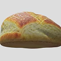 Freshly Baked Artisan Bread Loaf With Golden Crust And Soft Interior