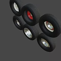 Assorted Car Tires With Different Wheel Rim Styles And Colors 3d model