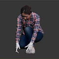 A Woman Wearing Plaid Shirt And White Gloves Squatting On Black Floor Checking Surface