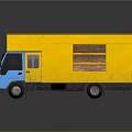 Daily Living Essentials Transported By Yellow Box Truck With Blue Cab And Wooden Sections