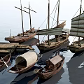 Traditional Wooden Sailing Boats Moored On Calm Water Surface With Reflections