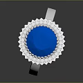 Intricately Sculpted Silver Ring With Blue Gemstone And Decorative Band Carvings