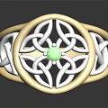 Exquisite Gold Ring With Green Gemstone And Intricate Metal Design