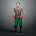 A Man Standing in Gray T-shirt Green Pants Red Gloves Black Boots on Gray Background