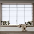 Beige Curtains by Window Seat with Decorative Pillows and Soft Fabric