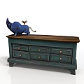 Vintage Blue Storage Cabinet With Wooden Top Multiple Drawers And Decorative Figurine