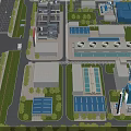 Aerial View of Industrial Plant with Multiple Buildings Blue Roofs Roads and Green Belts