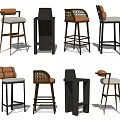 Bar Stools In Various Designs With Wooden And Metal Frames And Padded Seats