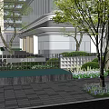 Modern Feature Wall Surrounded by Trees and Greenery with Paved Walkway and High Rise Buildings