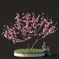 Decorative Pink Flower Tree With Serene Seated Statue On Green Grass