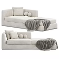 Modern Beige Chaise Lounge With Soft Round Cushions And Gray Throw Blanket