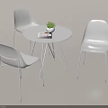 Modern White Dining Table Set With Round Table Three Chairs Potted Plant And Magazine
