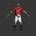 Man in Red Manchester United Jersey Standing with Soccer Ball and Arms Outstretched on Gray Background