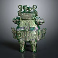 Ancient Chinese Bronze Vessel With Animal Head Decorations And Intricate Patterns