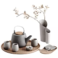 Stylish Gray Teapot With Tea Cups On Wooden Tray And Gray Vase With Branches