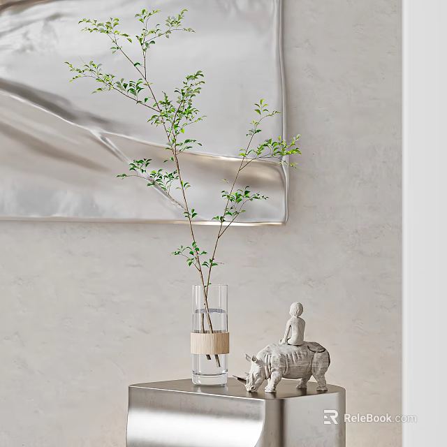 Transparent Vase With Green Branches Beige Band Near White Elephant Figurine Against Light Colored Wall 3d model 