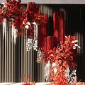 Elegant Red Decorative Flowers With Red Pillars Black Backdrop And Silver Pendants