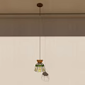 Artistic Pendant Light With Green Yellow Stained Glass Shade And Metal Frame Design