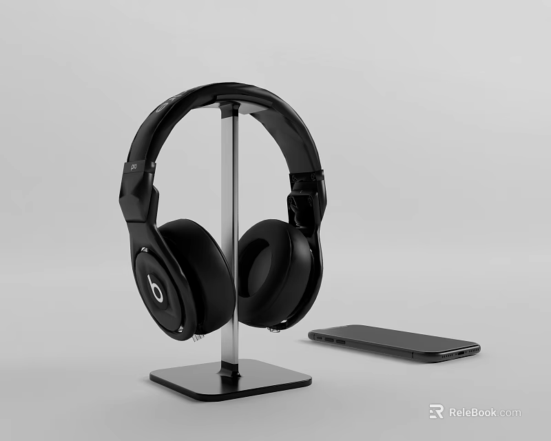 Black Over Ear Headphones On Stand With Smart Phone 3d model