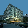 Modern Office Building With Glass Curtain Wall And Night Lighting In Urban Area