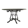 Round Cast Iron Outdoor Table With Lattice Design And Ornate Legs