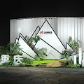 Floral Display with Hanging Cloud Shaped Decorations White Vertical Screens and Green Plants