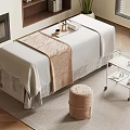 Serene Spa Treatment Room With Massage Table Metal Cart Fireplace Bookshelf And Potted Plant