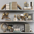 Golden Decorative Ornament Set With Bird Figurines Leaves Horse Books And Frames On Shelf