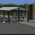 Industrial Plant Featuring Covered Loading Area Yellow Truck And Silver Storage Tank