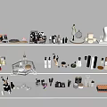 Elegant Decorative Ornament Collection On White Shelves With Perfume Bottles And Sculptures