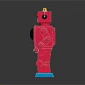 Red Vintage Robot Toy Standing On Black Reflective Surface With Blue Base And Chest Buttons