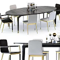 Dark Wooden Oval Dining Table Set With Black White Chairs Gold Legs And Decorative Items