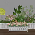 White Decorative Planters with Mixed Flowers and Green Plants for Outdoor Garden Decoration