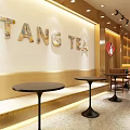 Modern TANG TEA Bubble Tea Shop Interior With Decorative Wall Round Tables And Bench Seating
