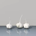 Three White Garlic Shaped Decorative Ornament Set On Gray Reflective Surface 3d model