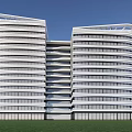 Modern Office Building With Curved Glass Curtain Wall And Green Lawn