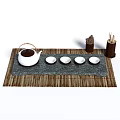 Traditional Tea Set With White Teapot Cups On Grey Stone Tray And Bamboo Mat