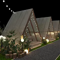 Garden Landscape with Triangular Tent Like Structures Glass Walls Gravel Path and Decorative Lights