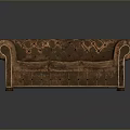 Vintage Brown Leather Sofa Featuring Quilted Design And Stitching Details