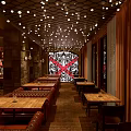 Modern Bar Interior With Wooden Tables Ceiling Lights And Decorative Mural
