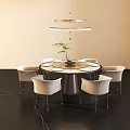 Modern Round Dining Table Set with Six White Chairs Central Green Plant and Pendant Light