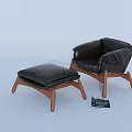 Modern Black Leather Single Sofa With Wooden Legs And Matching Ottoman Floor Magazine