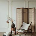 Modern Leisure Chair with Wooden Frame Light Cushion Near Woven Screen Table Vase and Branches
