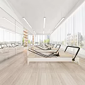 Spacious Pilates Studio With Reformers Mirrors Wooden Floors And Large Windows