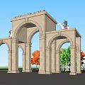 European Style Entrance Gate With Arch Design Stone Material And Sculptures Surrounding Orange Green Trees